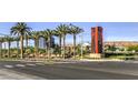 View of the Downtown Summerlin community sign with palm trees and mountain views in the background at 1064 Calvia St, Las Vegas, NV 89138