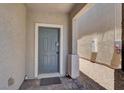 A welcoming covered entrance to this lovely home at 6106 Castle Gardens Ave, Las Vegas, NV 89130