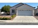 Charming single-story home with a two car garage and well-maintained landscaping in a suburban neighborhood at 9225 Lady Palm Ct, Las Vegas, NV 89147