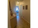 Hallway featuring a dresser and view into another room in the house at 9225 Lady Palm Ct, Las Vegas, NV 89147