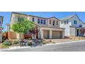 Beautiful two-story home with 2-car garage and attractive landscaping at 10161 Bismarck Palms Ave, Las Vegas, NV 89166