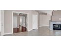 Inviting living space with tile and hardwood floors, and fireplace at 118 Westin Ln, Henderson, NV 89002