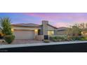 Inviting single-story home showcases a well-maintained front yard and a warm, neutral facade at 2069 Alto Vista Dr, Henderson, NV 89052