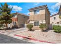 Inviting two-story home featuring desert landscaping and an attached garage in a suburban setting at 2149 Clancy St, Las Vegas, NV 89156