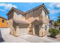 Attractive two-story home showcasing a clean design, attached garage, and desert-friendly landscaping at 2149 Clancy St, Las Vegas, NV 89156