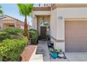 Inviting home entryway featuring desert landscaping, and a covered porch at 3320 Indian Moon Dr, Las Vegas, NV 89129