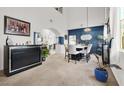 Dining room with high ceilings and a statement blue accent wall at 3389 Commendation Dr, Las Vegas, NV 89117