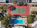 Aerial of community amenities include a tennis court, swimming pool, and mature landscaping at 8070 W Russell Rd # 1023, Las Vegas, NV 89113