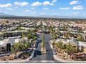 An aerial view showcases the community layout with lush landscaping and well-maintained streets at 8070 W Russell Rd # 1023, Las Vegas, NV 89113