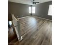 Upstairs loft area with hard wood flooring and natural light at 5709 Nobleton Ct, North Las Vegas, NV 89081