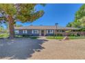 Inviting single-story home featuring desert landscaping, a covered porch, and a well-maintained exterior at 5755 W Meranto Ave, Las Vegas, NV 89139