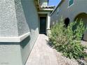 Charming front entrance with a covered porch and neat landscaping at 9348 Wildcat Peak St, Las Vegas, NV 89178