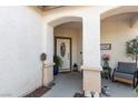 Welcoming front porch area with seating and decorative plants, creating a warm entry at , North Las Vegas, NV 89031
