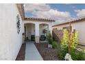 Inviting front porch with cozy seating and decorative accents, perfect for relaxing outdoors at , North Las Vegas, NV 89031