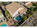 Aerial view of backyard with pool, patio, and garden area at 1779 Antelope Valley Ave, Henderson, NV 89012
