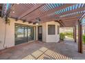 Inviting covered patio with a ceiling fan, perfect for enjoying the outdoors in comfort at 454 Intrepid Ct, Boulder City, NV 89005