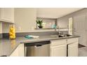 Modern kitchen featuring stainless steel appliances and sleek countertops at 5710 E Tropicana Ave # 2225, Las Vegas, NV 89122