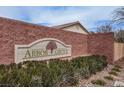 Arbor Grove brick community sign, nicely landscaped with greenery, and situated in a tranquil neighborhood at 10513 Shanna Trellis Ave, Las Vegas, NV 89144