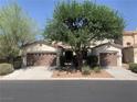 Charming single-story home with two-car garage and mature landscaping at 3328 White Bark Pine St, Las Vegas, NV 89129