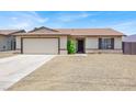 Charming single-story home featuring a two-car garage and low-maintenance landscaping at 5030 E Hacienda Ave, Las Vegas, NV 89122