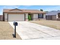 Charming single-story home featuring a two-car garage and low-maintenance landscaping at 5030 E Hacienda Ave, Las Vegas, NV 89122