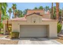 Charming home featuring a two-car garage and tile roof at 5228 Painted Lakes Way, Las Vegas, NV 89149