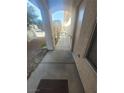 View of covered front porch featuring a security gate at 5404 Walcott Dr, Las Vegas, NV 89118