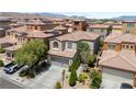 An aerial view showcasing the property among other neighborhood homes in the surrounding area at 9074 Iron Cactus Ave, Las Vegas, NV 89148