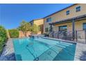 Backyard features a private pool, spa, and covered patio perfect for relaxation at 9542 Ridgeglen Ct, Las Vegas, NV 89148