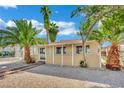Attractive single-story home featuring a gravel front yard and palm trees at 101 N 19Th St, Las Vegas, NV 89101