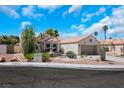 Charming single-story home with desert landscaping, tile roof, and a two-car garage at 2860 Misty Ct, Henderson, NV 89074