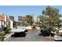 Exterior street view with covered parking at condo complex at 3606 Di Salvo Dr # 133, Las Vegas, NV 89103