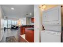 Modern living space featuring an open floor plan, hardwood floors, and an in-unit washer and dryer at 4525 Dean Martin Dr # 2203, Las Vegas, NV 89103