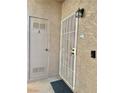 Apartment entry featuring secure steel door and Ring security system for modern safety and convenience at 5576 W Rochelle Ave # 27A, Las Vegas, NV 89103