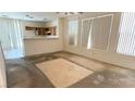 Spacious living room with large windows, awaiting personal touches at 2613 Calico Hearts Ct, Las Vegas, NV 89106