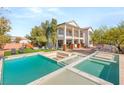 Expansive backyard featuring a luxurious pool, spa, and plenty of space for entertaining at 6315 Bellisima St, Las Vegas, NV 89118