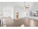 Spacious living room features vaulted ceilings, fireplace, and wood-look flooring at 1911 Hobson Dr, Henderson, NV 89074
