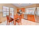 Bright kitchen and dining area with stainless steel appliances and plenty of natural light at 2352 Pickwick Dr # 85, Henderson, NV 89014