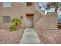 Close-up of condo entrance with secure metal screen door at 2983 Juniper Hills Blvd # 102, Las Vegas, NV 89142