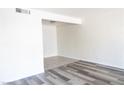 Living room showing bright white walls and light, modern flooring at 605 S Royal Crest Cir # 8, Las Vegas, NV 89169