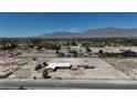 Residential lot features a home, RV, truck, and mountain views at 7130 Bilpar Rd, Las Vegas, NV 89131