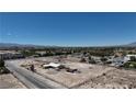 Large lot with a single-story home, RV, and multiple vehicles at 7130 Bilpar Rd, Las Vegas, NV 89131