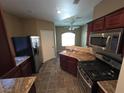 Updated kitchen with a view, featuring stainless steel appliances and granite countertops at 9000 Las Vegas Blvd # 2101, Las Vegas, NV 89123