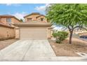Charming two-story home with a large garage, landscaped front yard, tile roof, and drought-tolerant landscaping at 9626 Grapeland Ave, Las Vegas, NV 89148