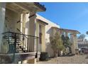 Exterior showcasing the stairways that lead to covered entries of multiple units at 4451 Rich Dr # D, Las Vegas, NV 89102