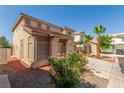 Inviting two-story home with manicured landscaping and a private driveway at 5402 Shady Lair Ct, North Las Vegas, NV 89031