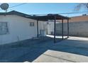 Spacious backyard featuring a covered patio perfect for outdoor entertaining at 1316 Lawry Ave, Las Vegas, NV 89106