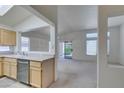 Bright kitchen featuring modern appliances, white countertops and an open layout at 2101 High Mesa Dr, Henderson, NV 89012
