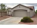Charming single-story home with desert landscaping and a spacious two car garage at 438 Fountain Grove St, Henderson, NV 89012