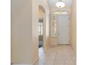 Inviting foyer with tile flooring, natural light, and neutral walls at 4760 Verdet St, Las Vegas, NV 89147